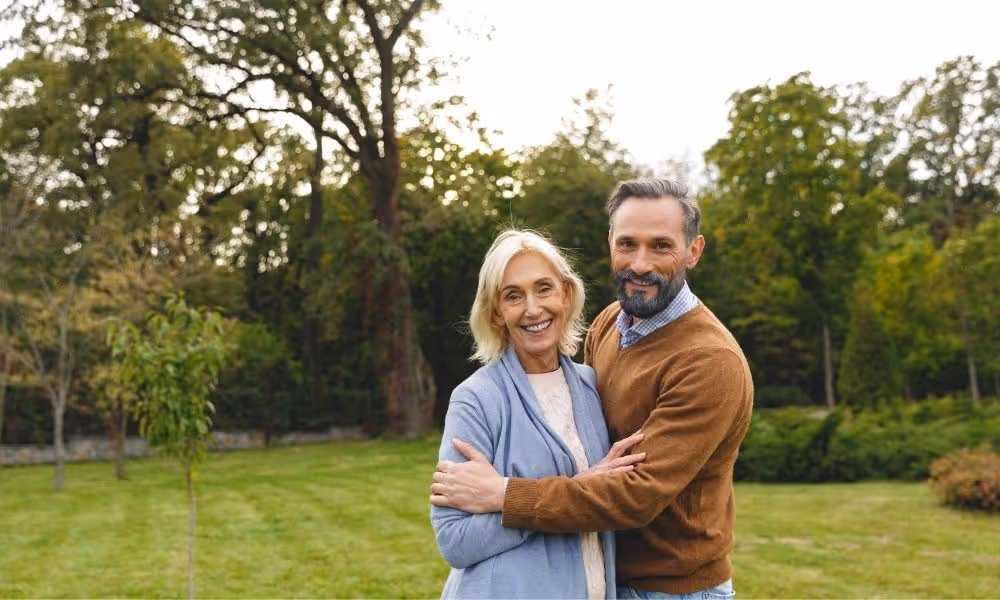 5 Ret Questions to Ask Mature couple embracing outside.